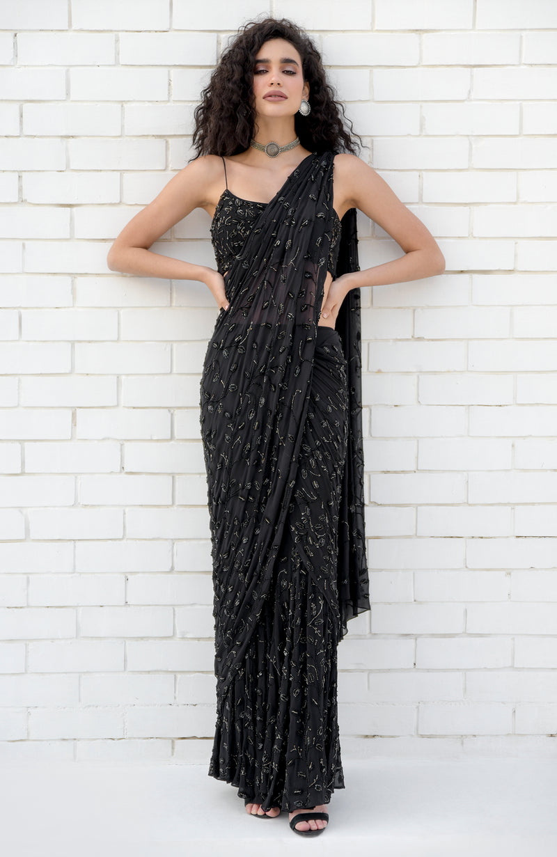 Shruti Haasan looks beautiful in a plain black saree – South India Fashion